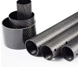 Carbon fiber round tubing with precision-drilled holes for structural assembly.